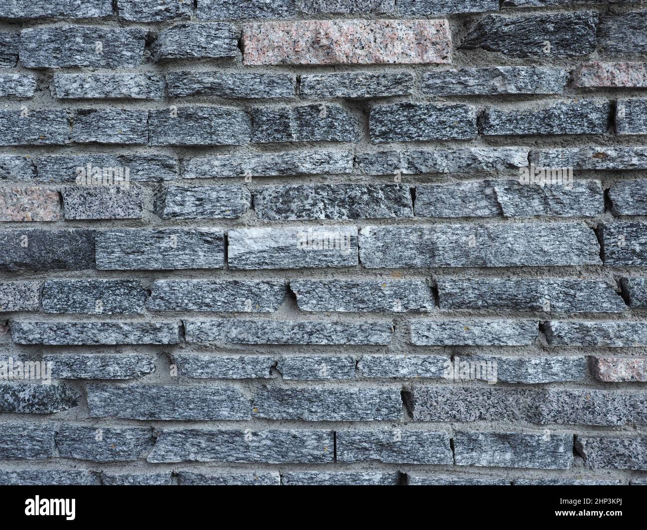 dark grey stone wall useful as a background Stock Photo - Alamy