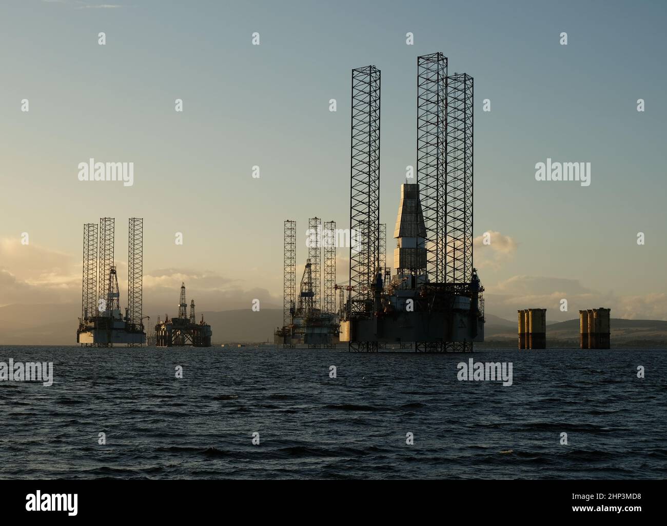 A colour photograph of oil rigs in the Cromarty Firth. Taken from ...