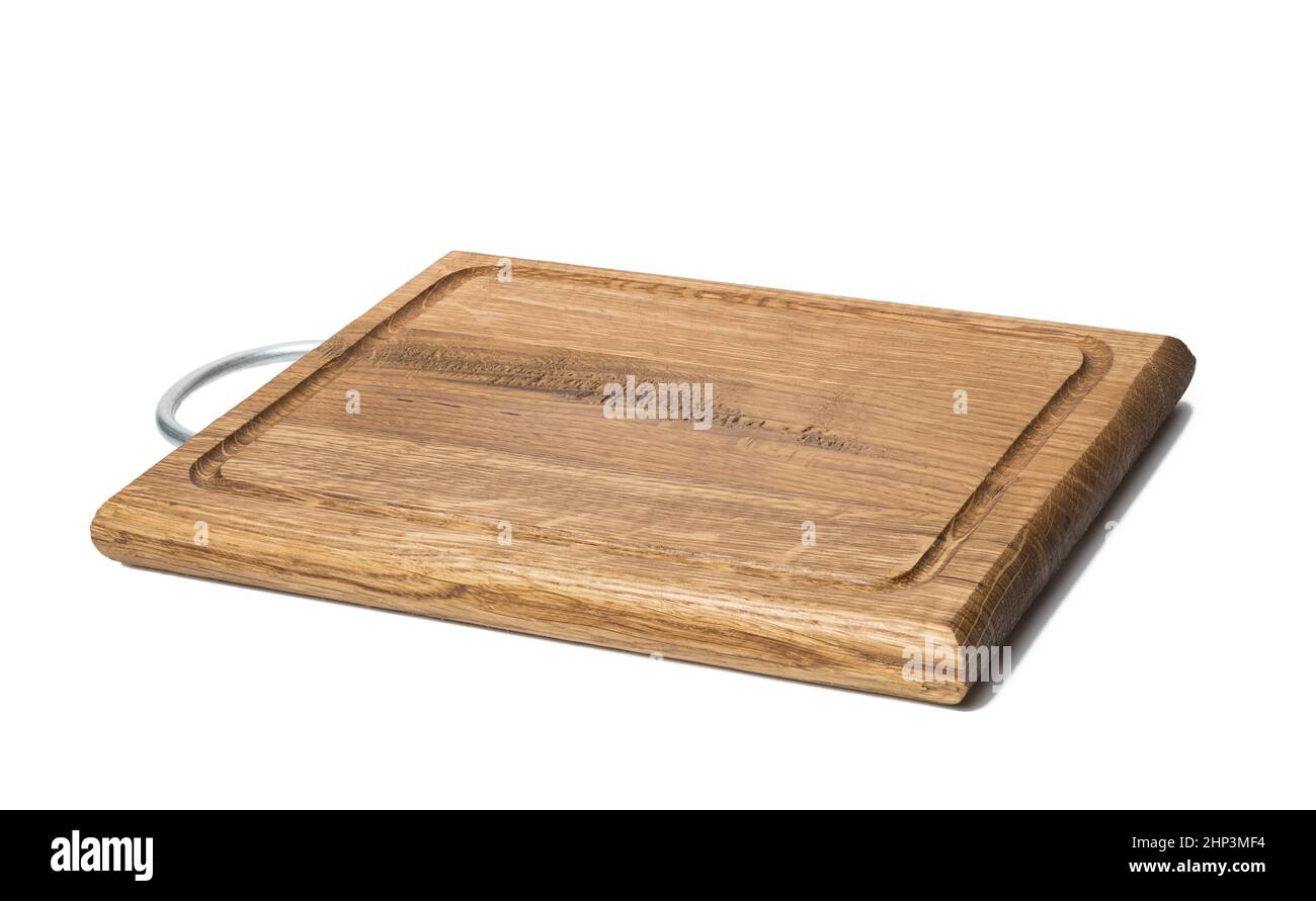 empty rectangular wooden oak kitchen cutting board. White background Stock Photo