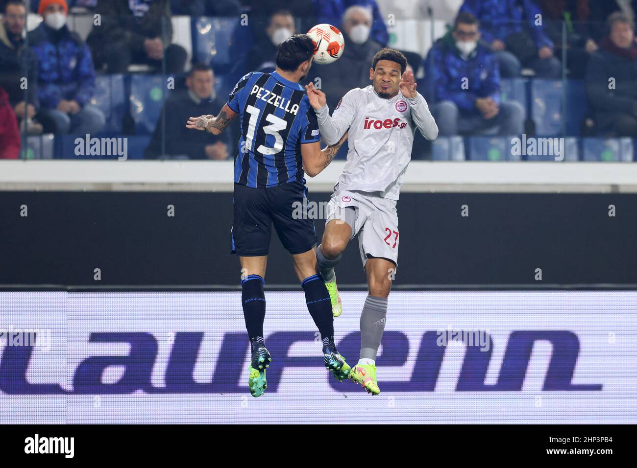 Bergamo, Italy, 17th February 2022. Giuseppe Pezzella of Atalanta and Kenny Lala of Olympiacos FC contests for an aerial ball during the UEFA Europa League match at Gewiss Stadium, Bergamo. Picture credit should read: Jonathan Moscrop / Sportimage Credit: Sportimage/Alamy Live News Stock Photo
