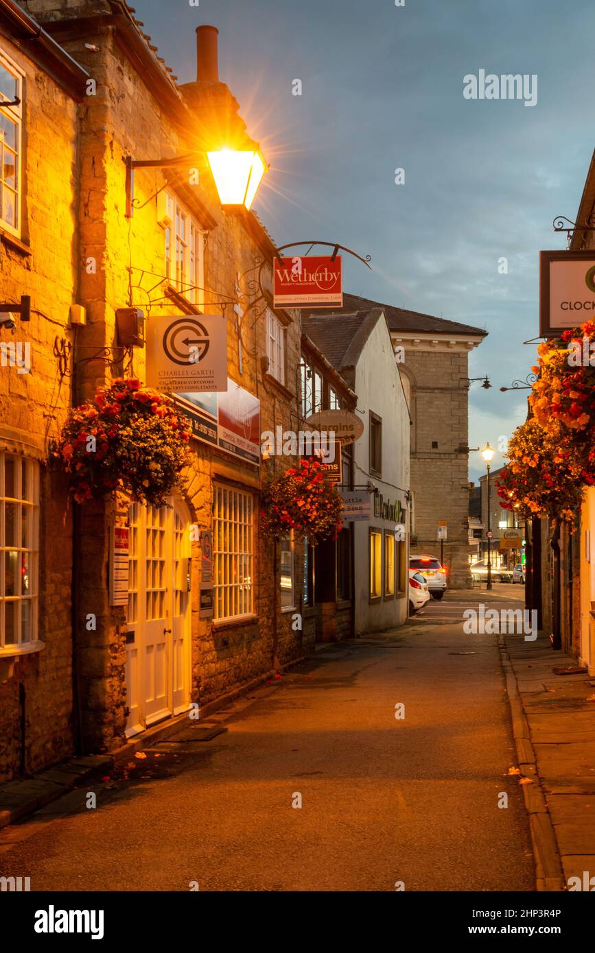 Evening view of Church Street - a street of varied small independent shops in the centre of Wetherby, West Yorkshire Stock Photo