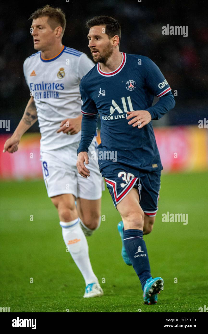 PARIS, FRANCE - FEBRUARY 15: Toni Kroos, Lionel Messi during the UEFA Champions League Round of Sixteen Leg One match between Paris Saint-Germain and Stock Photo