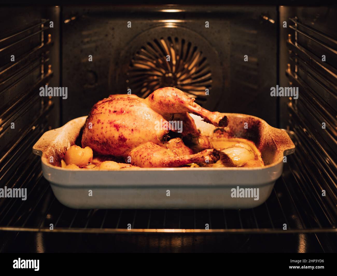 Grilled Chicken in the hot oven. Poultry meal for Christmas and Thanksgiving. Stock Photo