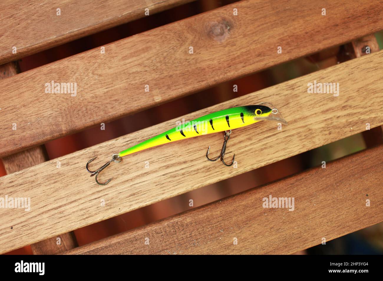 homemade wobbler for fishing large fish on the wooden deck Stock