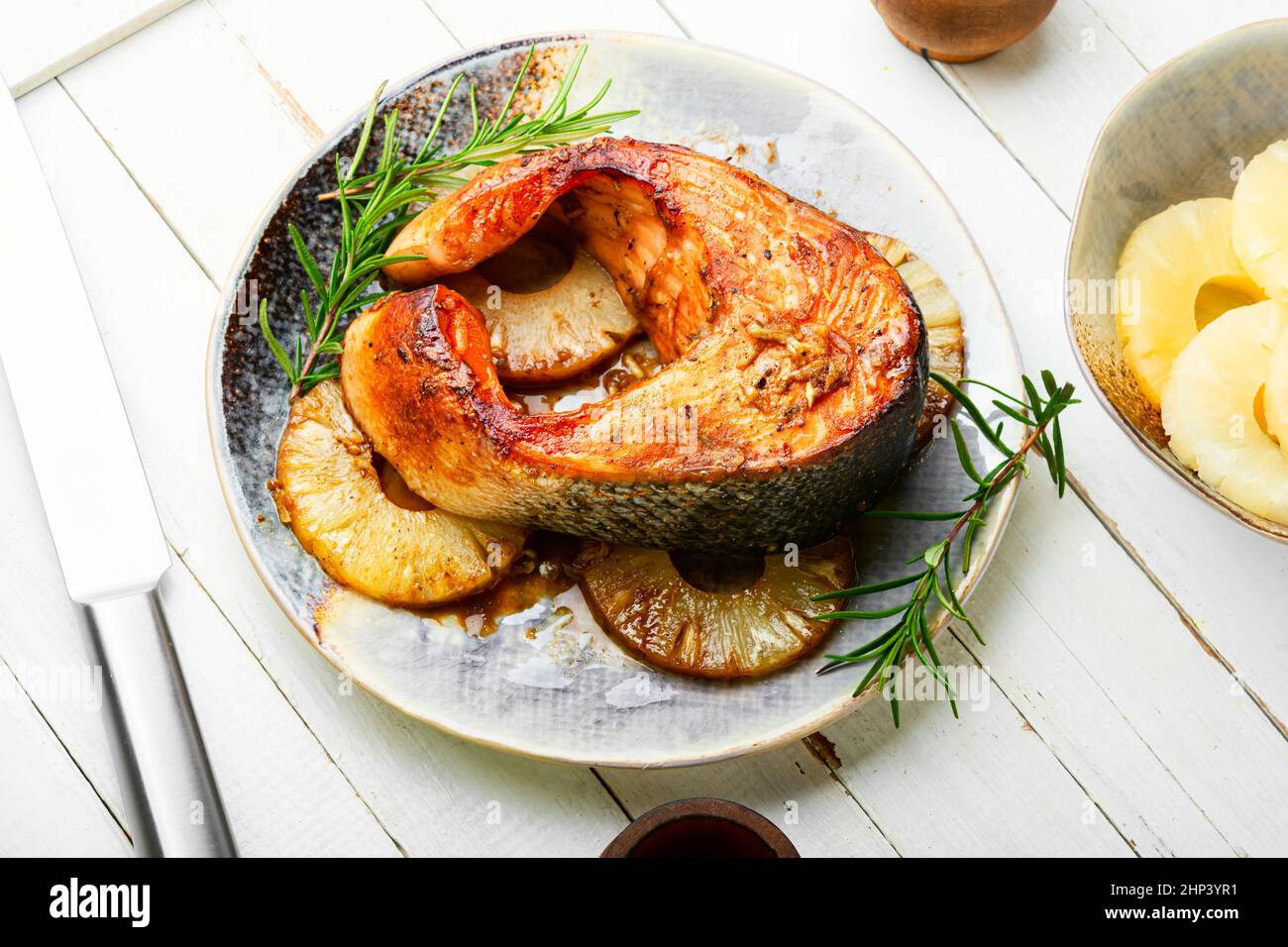 Fish Part Steak Fried trout fish steak with pineapple. Salmon steak Stock Photo - Alamy