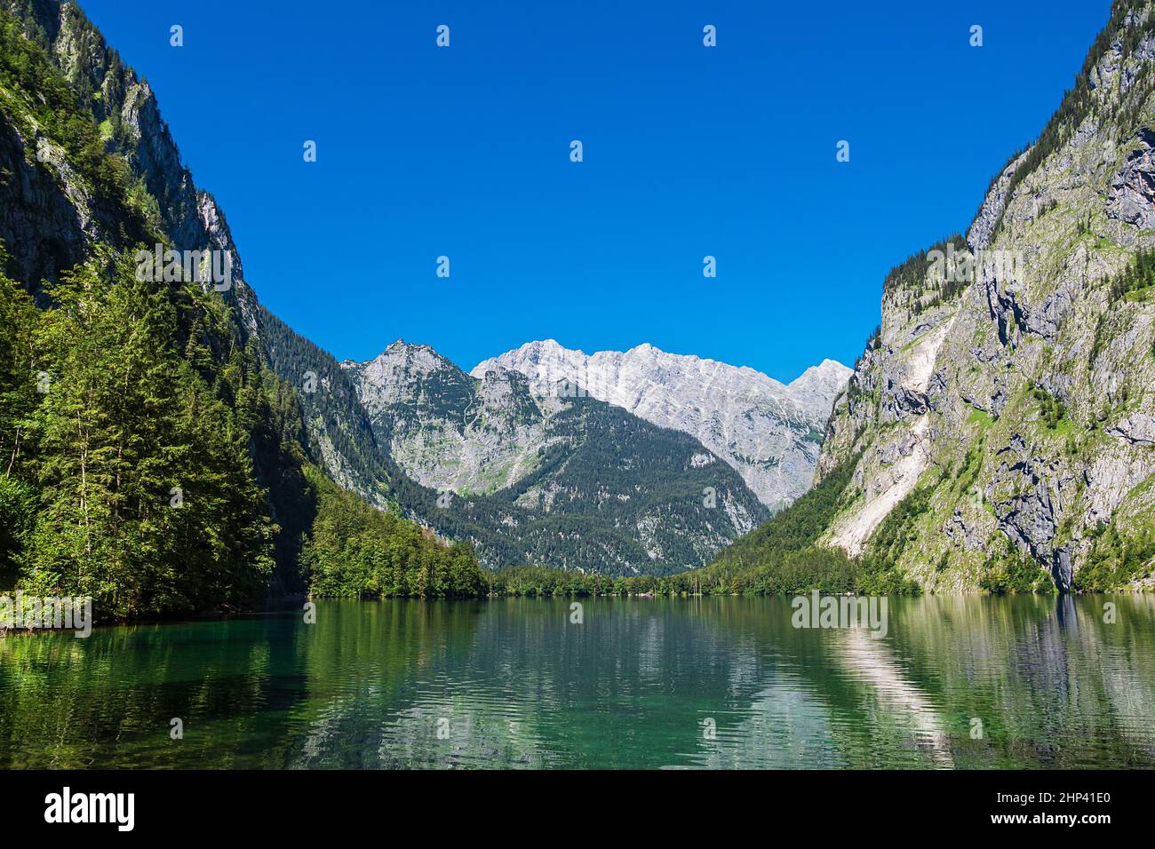 Lake Koenigssee with rocks and trees in the Berchtesgaden Alps, Germany ...