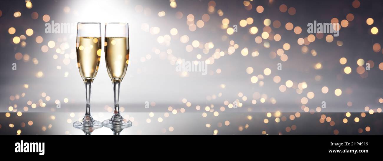 Glasses of champagne with splash, celebration theme concept Stock Photo