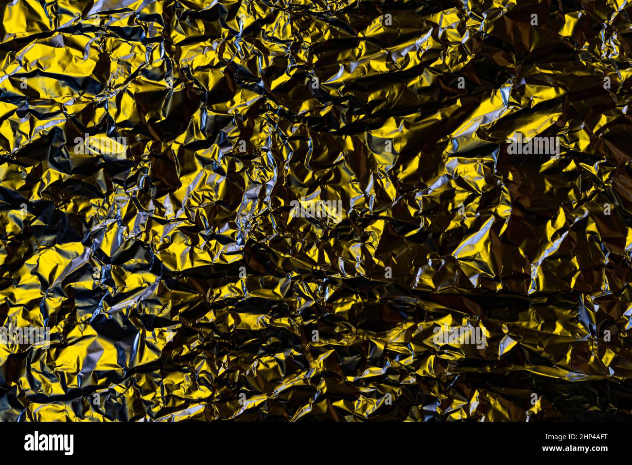 Aluminum foil with multi-colored illumination . Background and