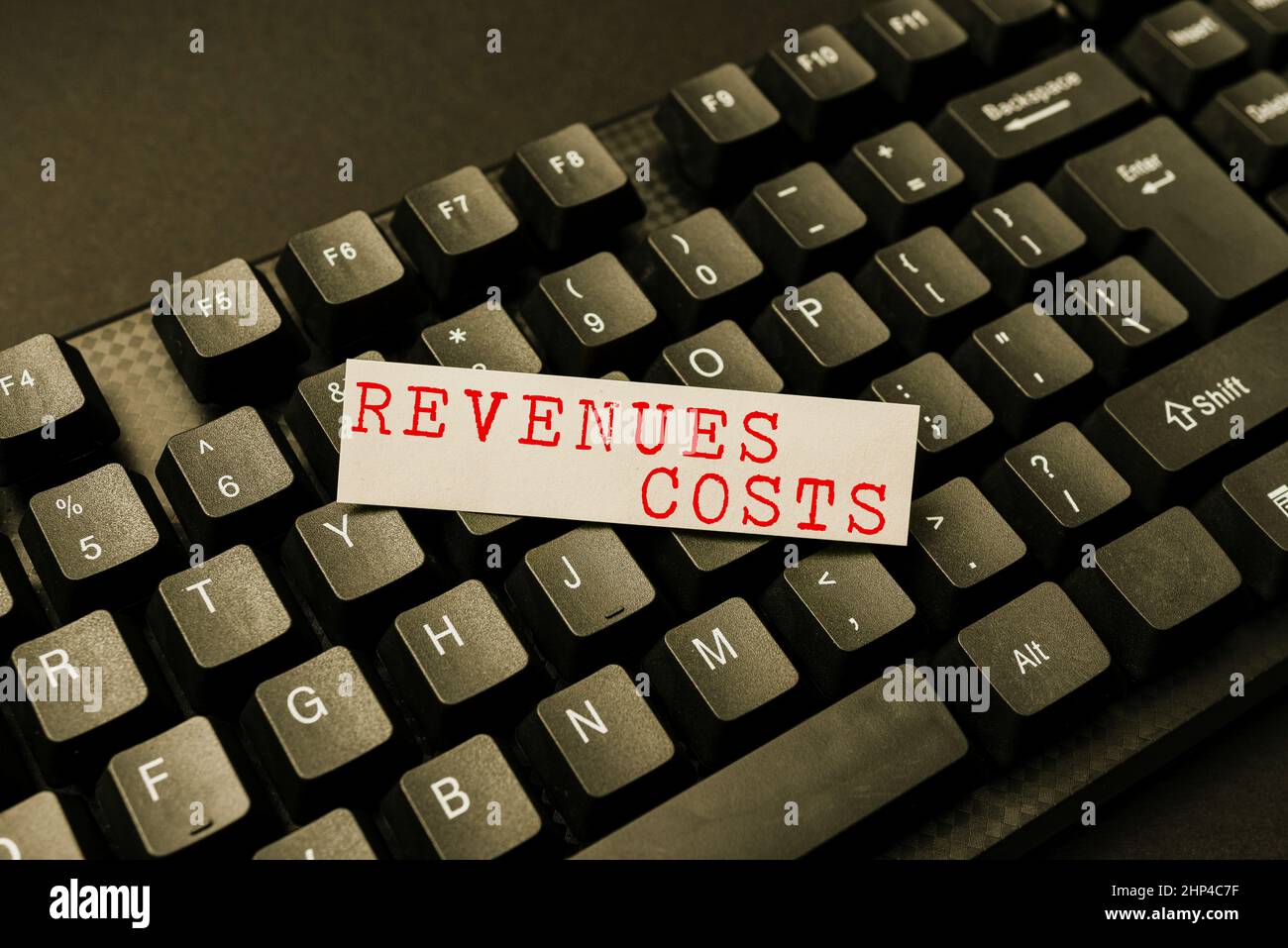 Text showing inspiration Revenues Costs, Internet Concept Total amount of money in Manufacturing and Delivery a product Entering New Programming Codes Stock Photo