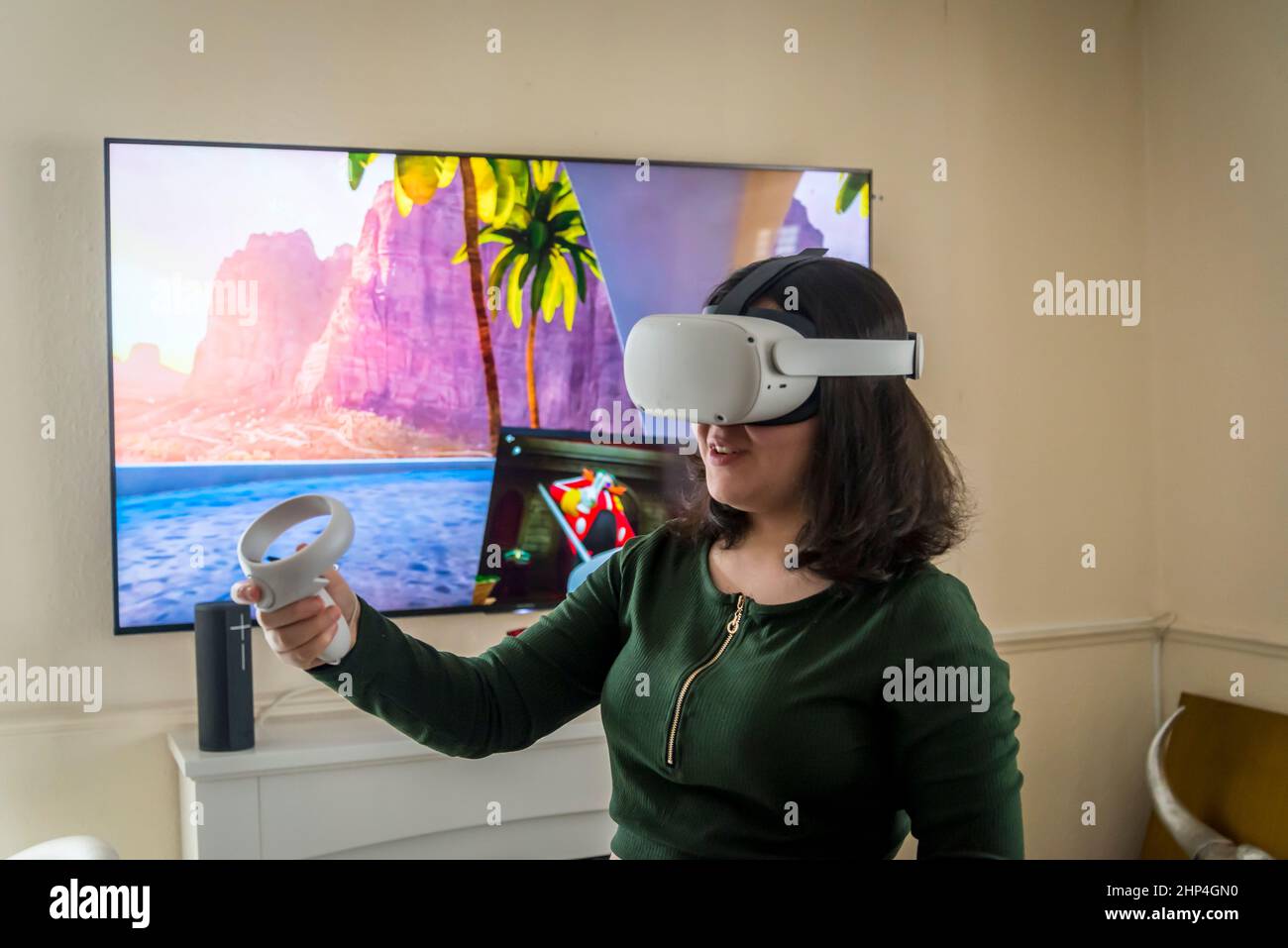 Child with VR head set. A new generation gaming device for entertainment  and sport. Oculus Quest 2 Stock Photo - Alamy