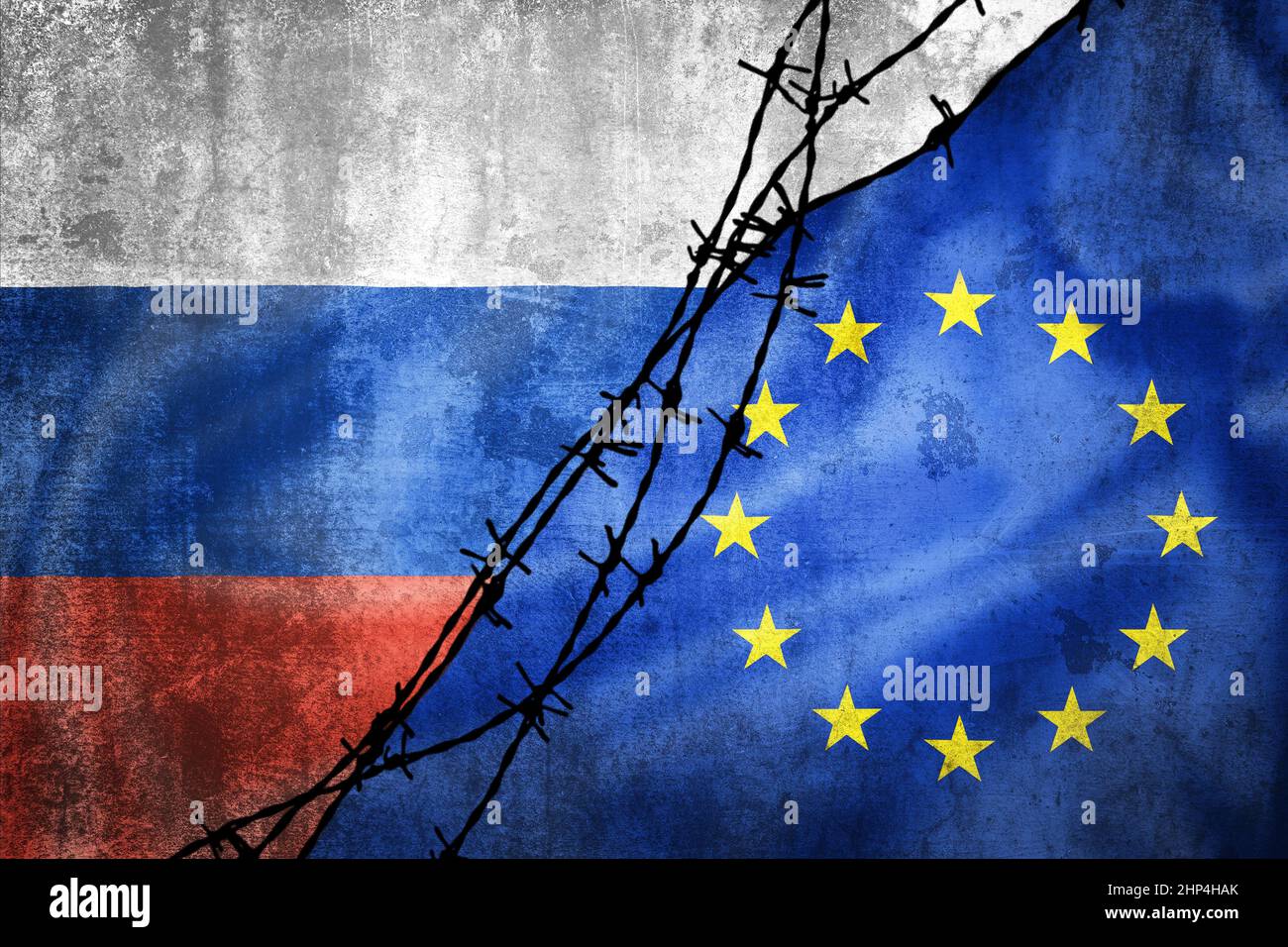 Grunge flags of Russia and European Union divided by barb wire illustration, concept of tense relations in Ukraine crisis Stock Photo