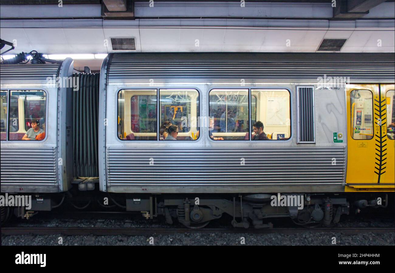 Metro train in underground station with passengers viewed through windows in Brisbane Queensland Australia 2 25 2015 Stock Photo