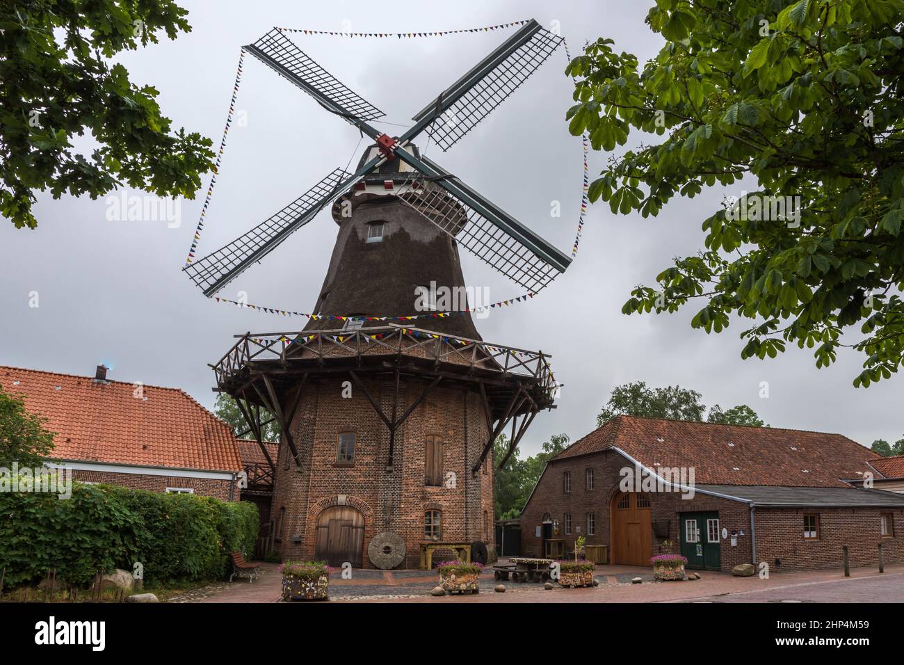 Traditional windmill in Jever, Schlachtmuehle, East Frisia, Lower Saxony, Germany Stock Photo