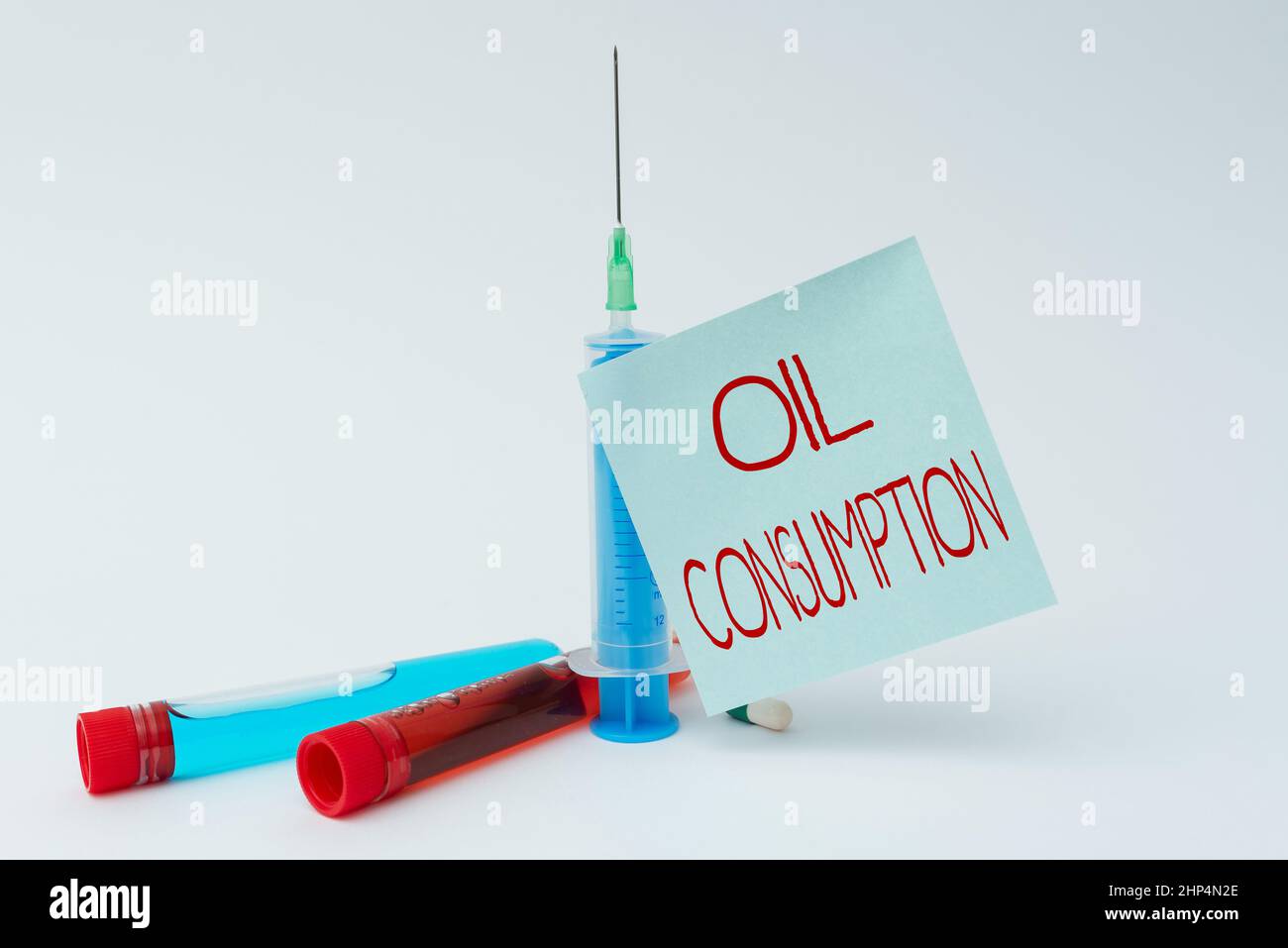 Conceptual caption Oil Consumption, Business approach This entry is the total oil consumed in barrels per day Writing Important Medical Notes Laborato Stock Photo