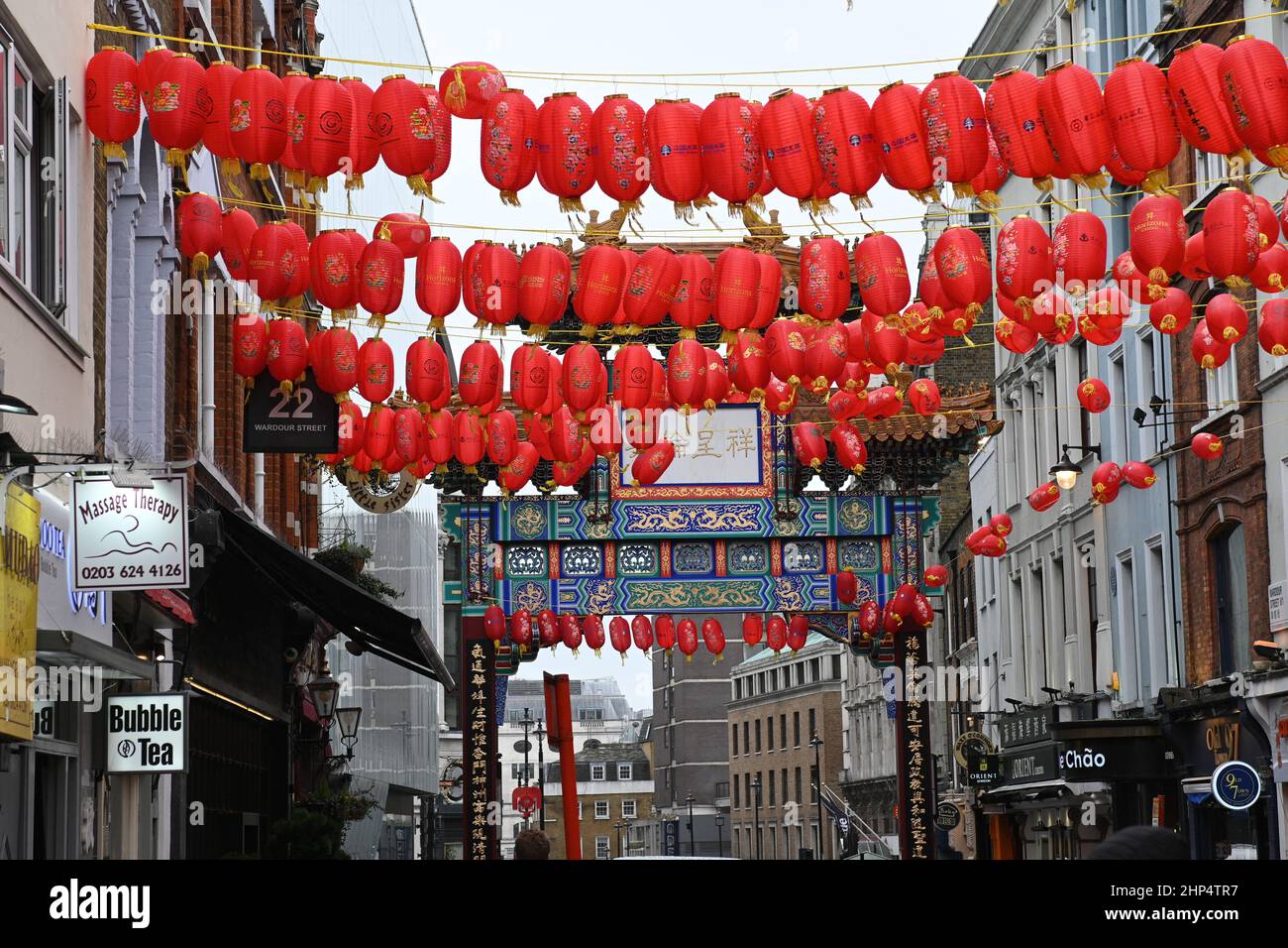 London Weather, UK, 18 February 2022.  London Chinatown is the main attraction of the city of London. Tourists adore dining in London Chinatown good food and reasonable price. Stock Photo