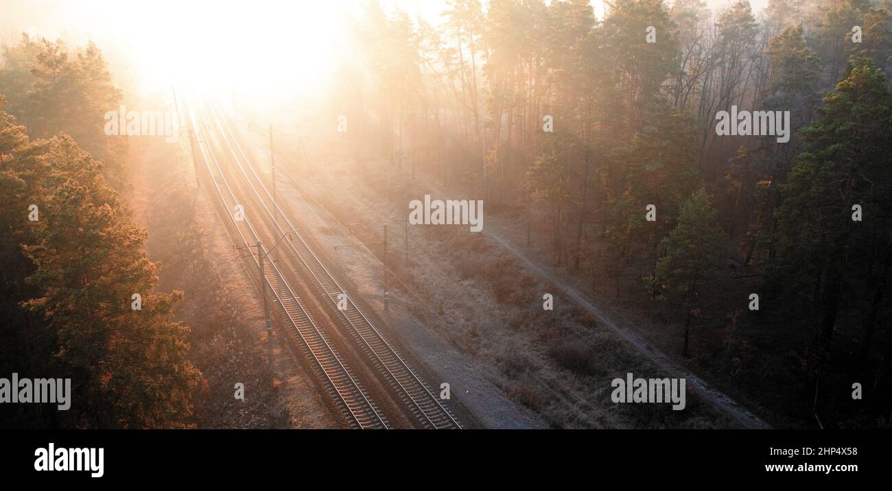 Freight train at high speed, top view, motion blur. Drone view Stock