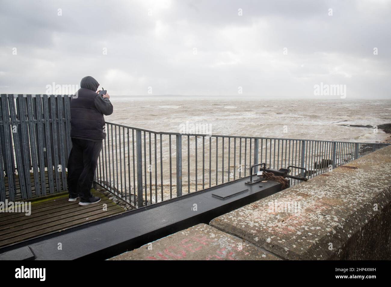 CANVEY ISLAND, ESSEX, FEBRUARY 18 2022, Storm Eunice hits the East Of England, The Met Office has issued two rare red warnings as the UK is hit by rain, snow and record-breaking 122 mph winds during the worst storm for 30 years. Credit: Lucy North/Alamy Live News Stock Photo