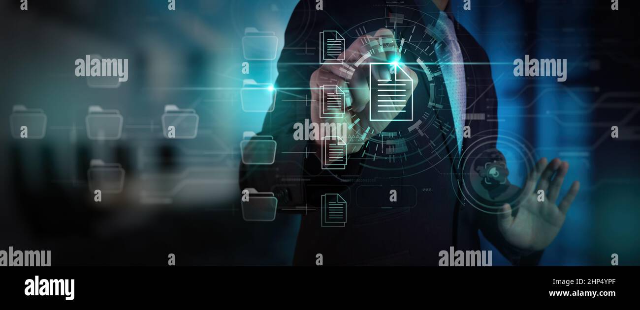 Businessman workimn Document Management System (DMS),Virtual online documentation database and process automation to efficiently manage files, knowled Stock Photo