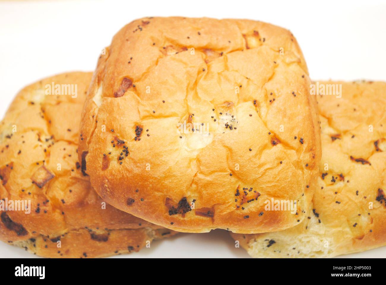 A Close-up of Onion Rolls on a White Platter Stock Photo