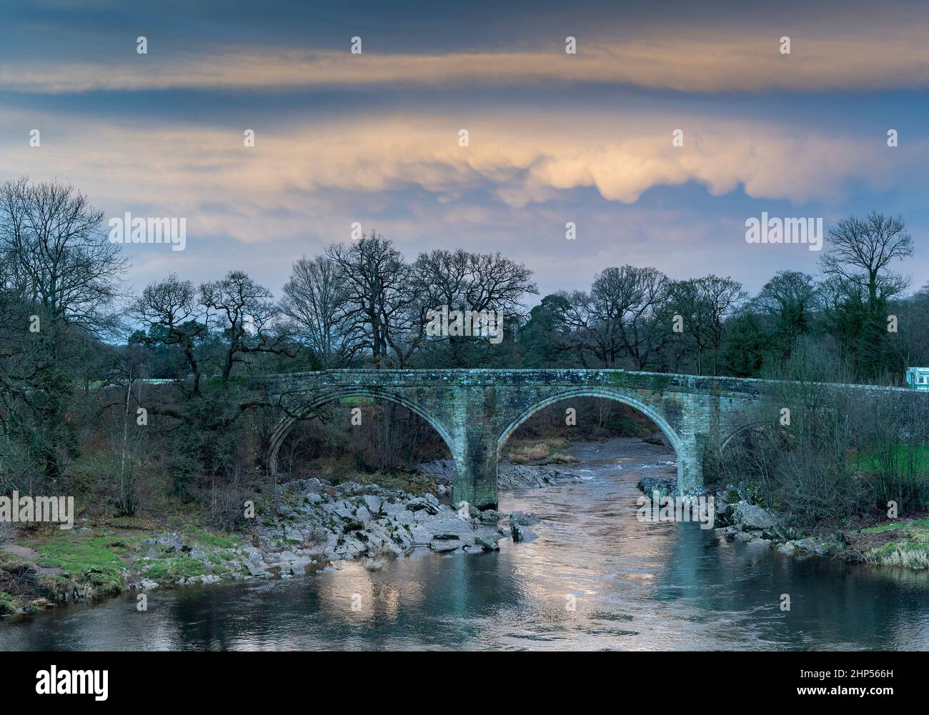 Stormy sky over Devils Bridge and the River Lune, in early winter, Kirkby Lonsdale  Cumbria, UK Stock Photo