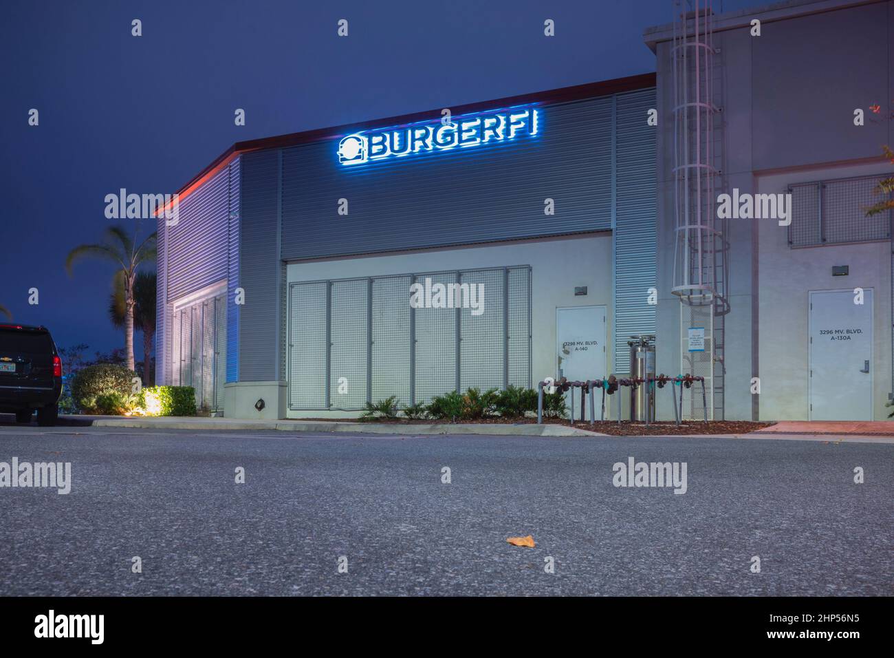 Orlando, Florida February 6, 2022 Horizontal Night View of BurgerFi Restaurant Building Back