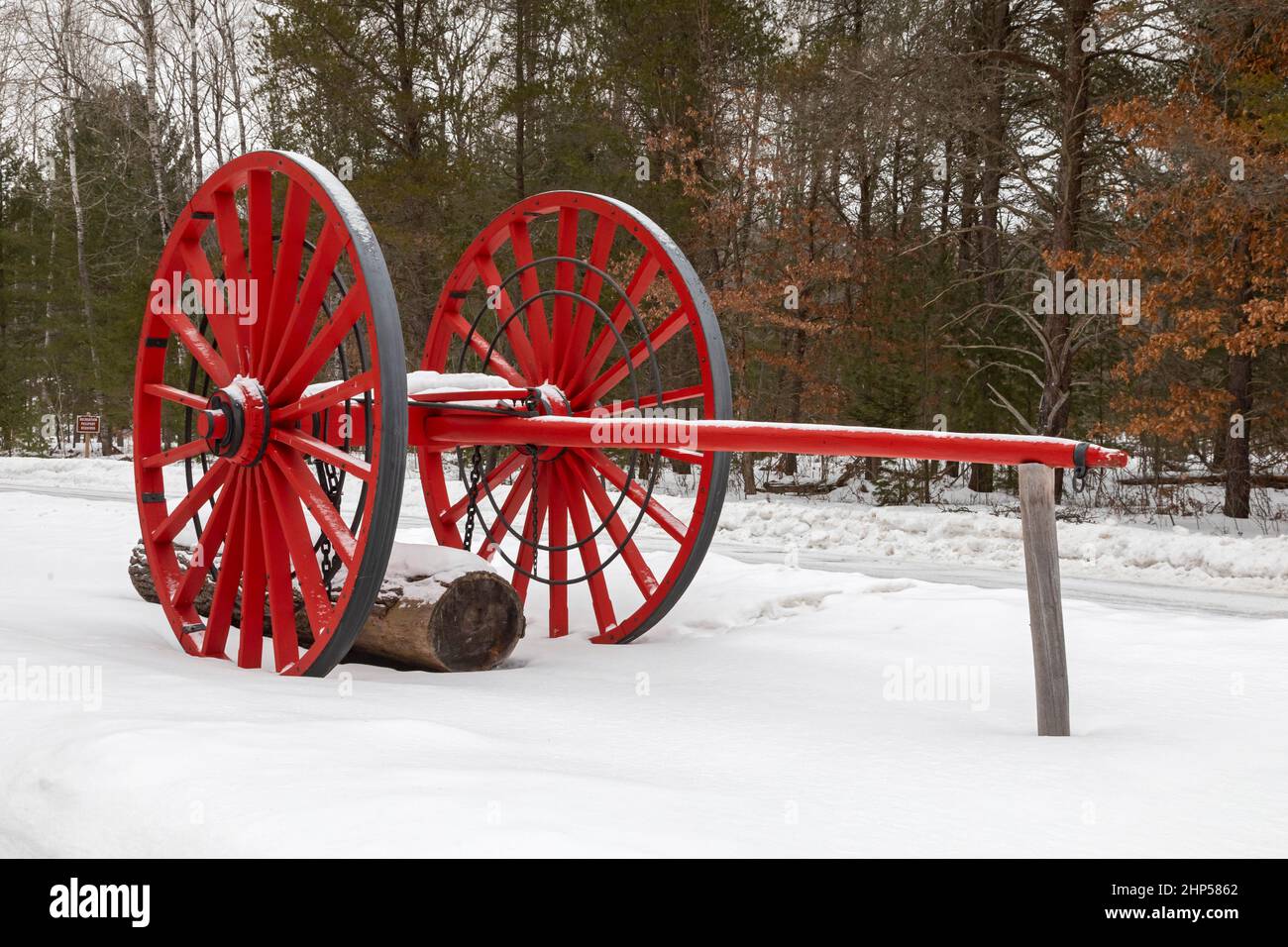 Grayling, Michigan - A Big Wheel used for transporting logs on display at Hartwick Pines State Park. The park displays logging equipment from the 19th Stock Photo