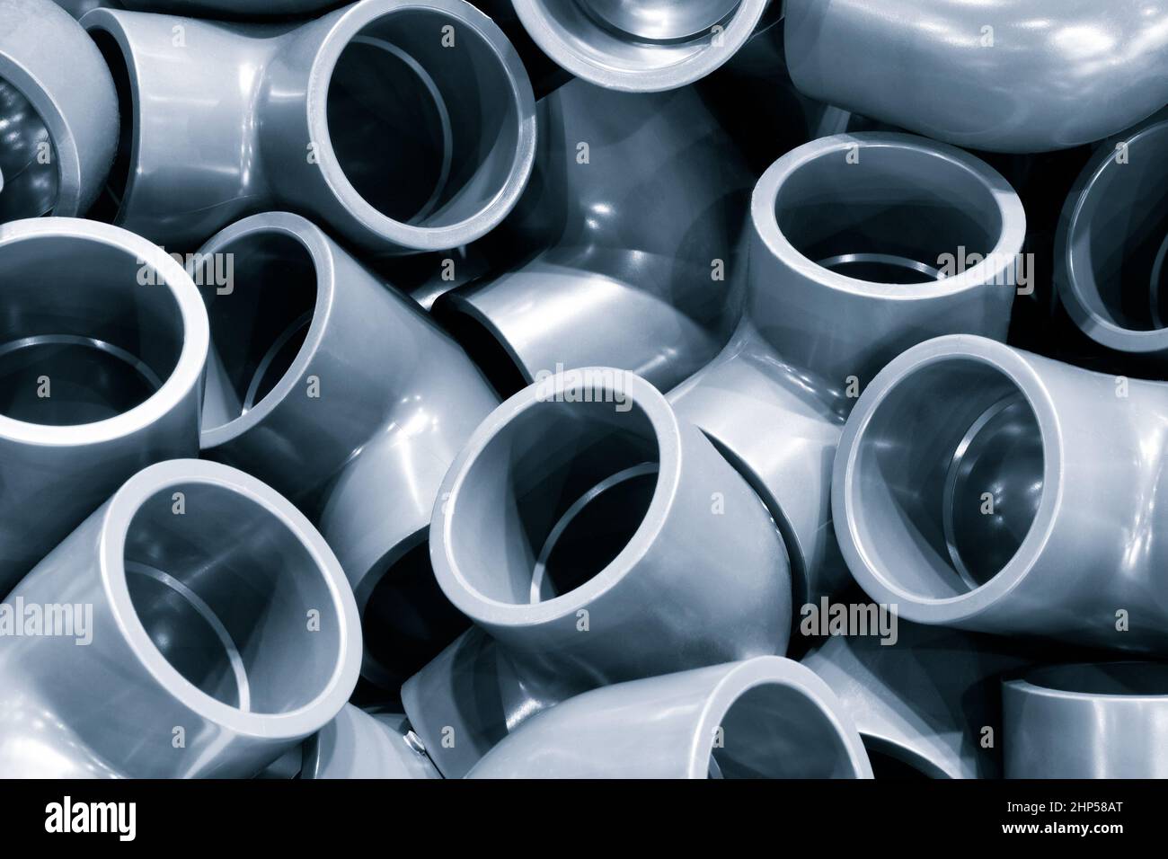Grey pvc plumbing pipes corners background closeup Stock Photo Alamy