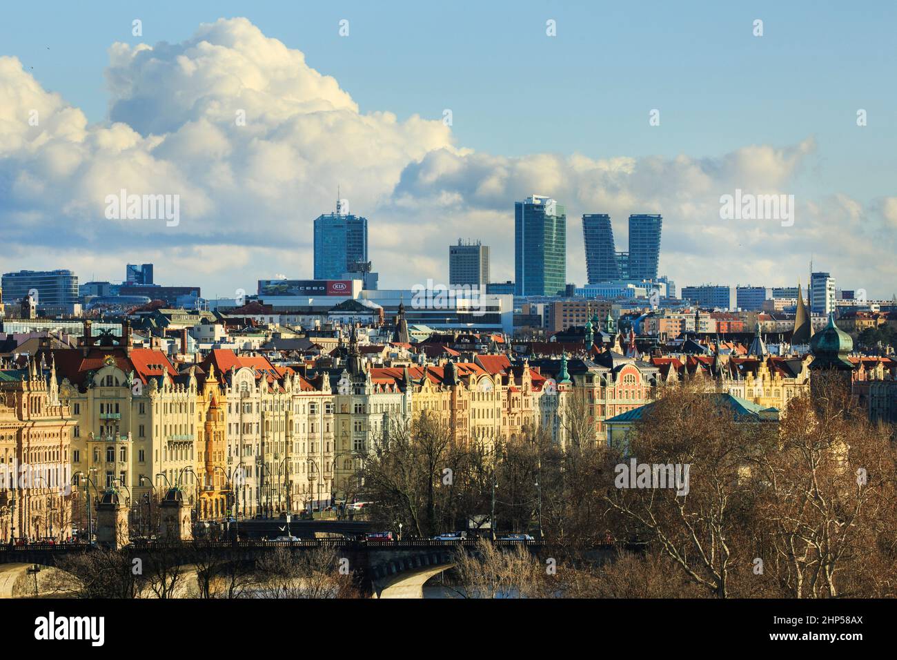 View of the V Tower and other modern high rise buildings in the Business District over the roofs of Prague old town. Stock Photo