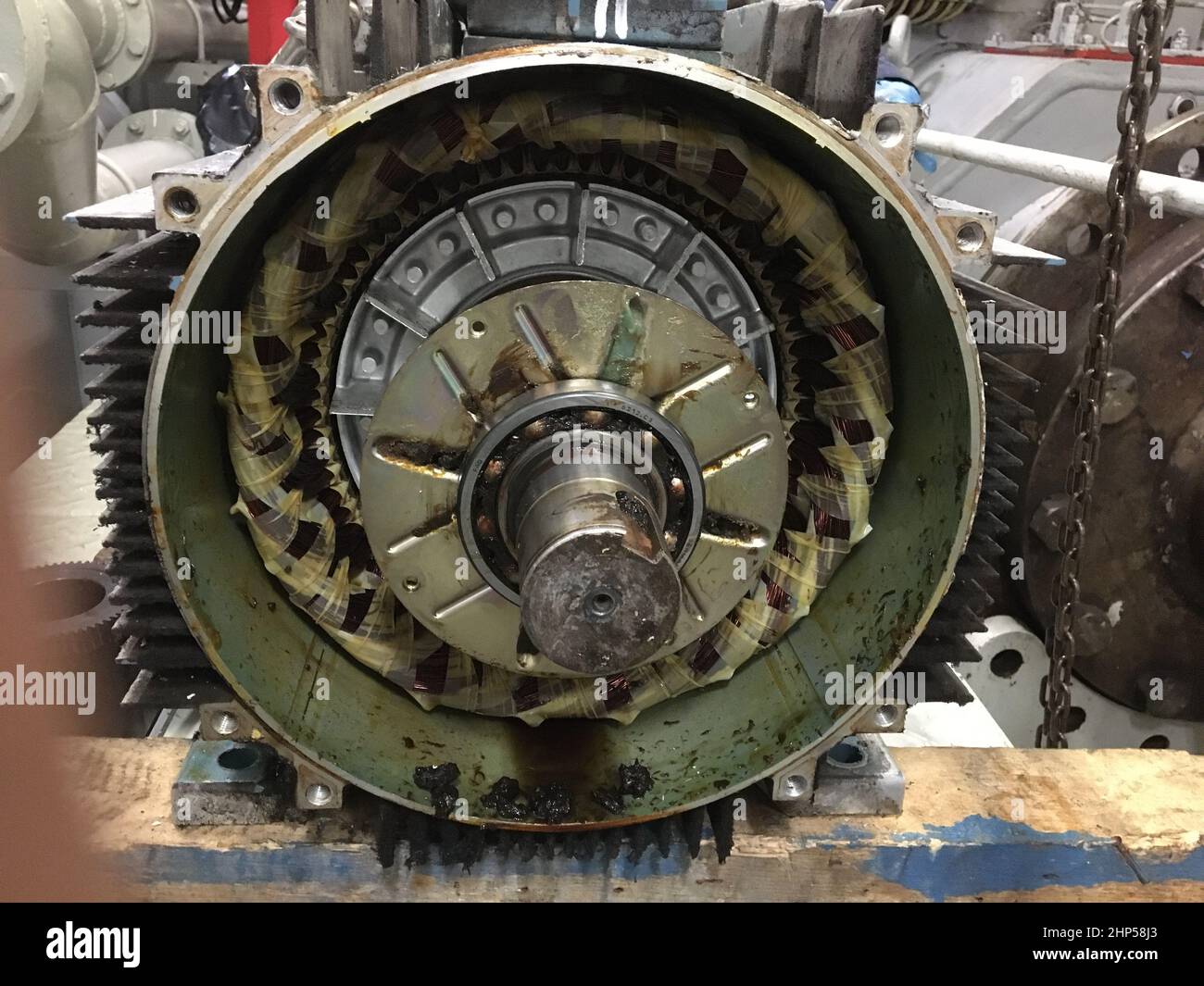 ships crew doing electrical motor repair,bearing replacement of