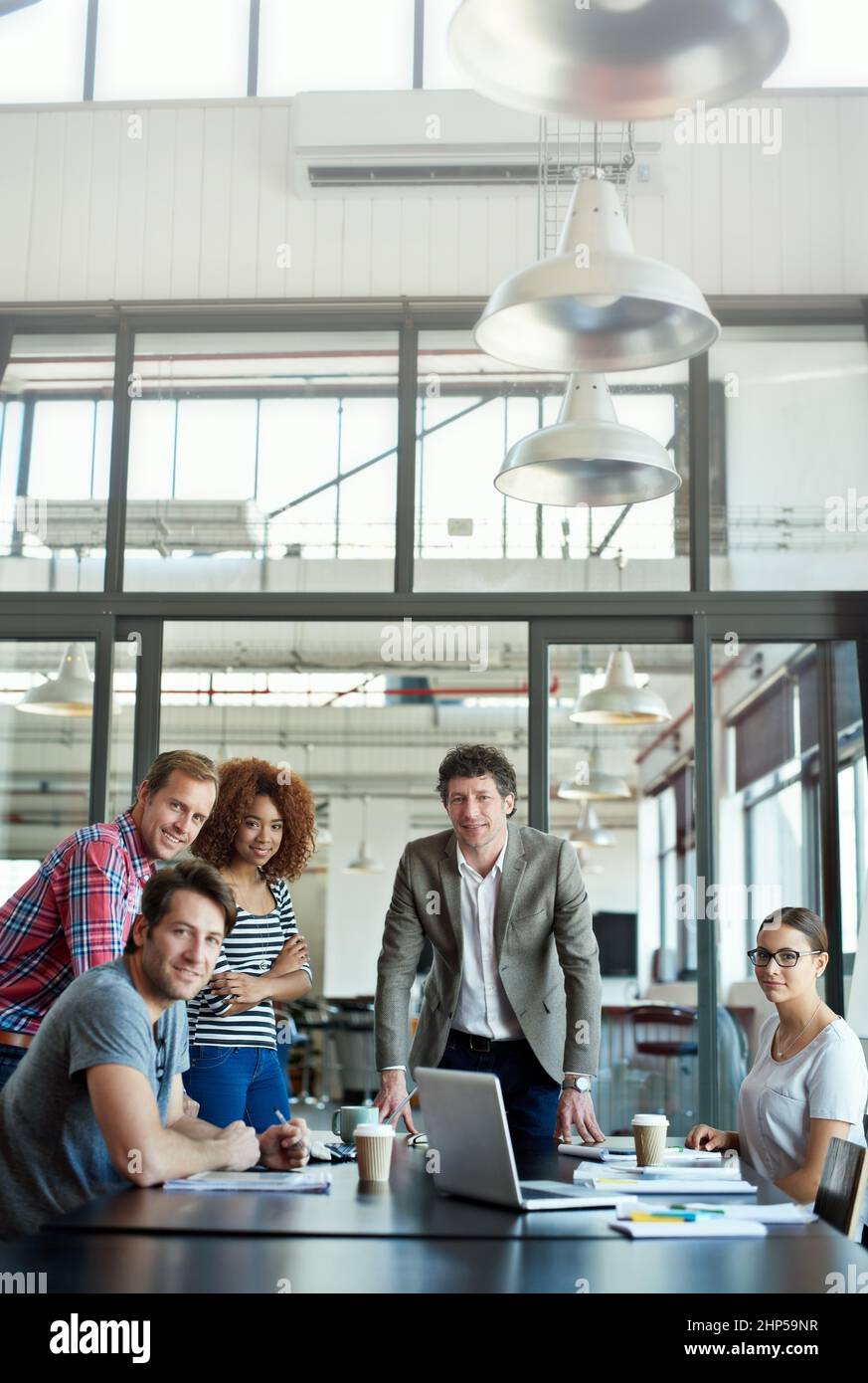 Portrait of the pros. Portrait of office workers in a meeting in a