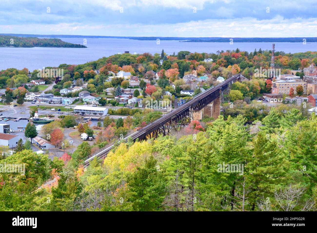 Panoramic view of downtown Parry Sound and harbour with elevated rail bridge Stock Photo