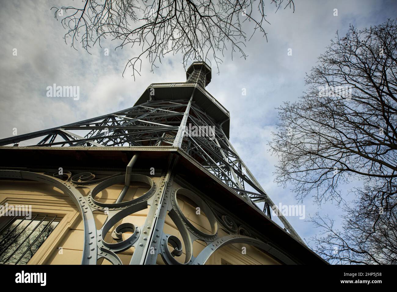 Low angle view looking up the Petrin Lookout Tower showing rivets and metal scrolls decorating the lower tower, Prague, Czech republic Stock Photo