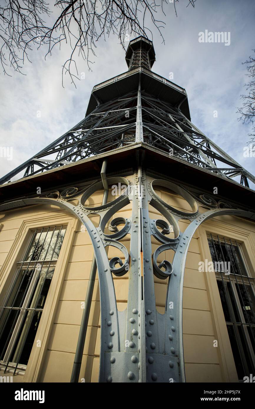 Low angle view looking up the Petrin Lookout Tower showing rivets and metal scrolls decorating the lower tower, Prague, Czech republic Stock Photo