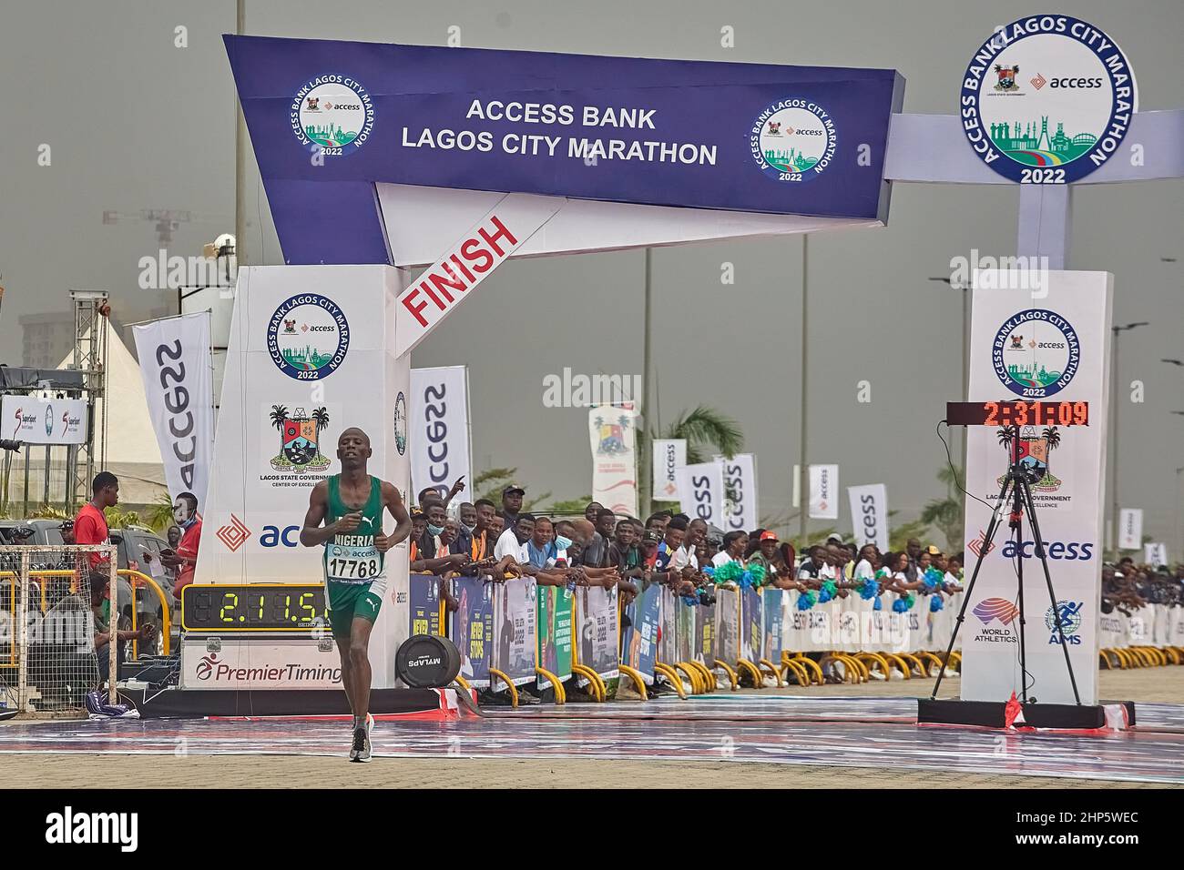 Nigerian winner, Adamu Shehu Muazu crosses the finish line in the Access Bank Lagos City Marathon, a 42km Silver-Label Race held in Lagos, Nigeria. Stock Photo