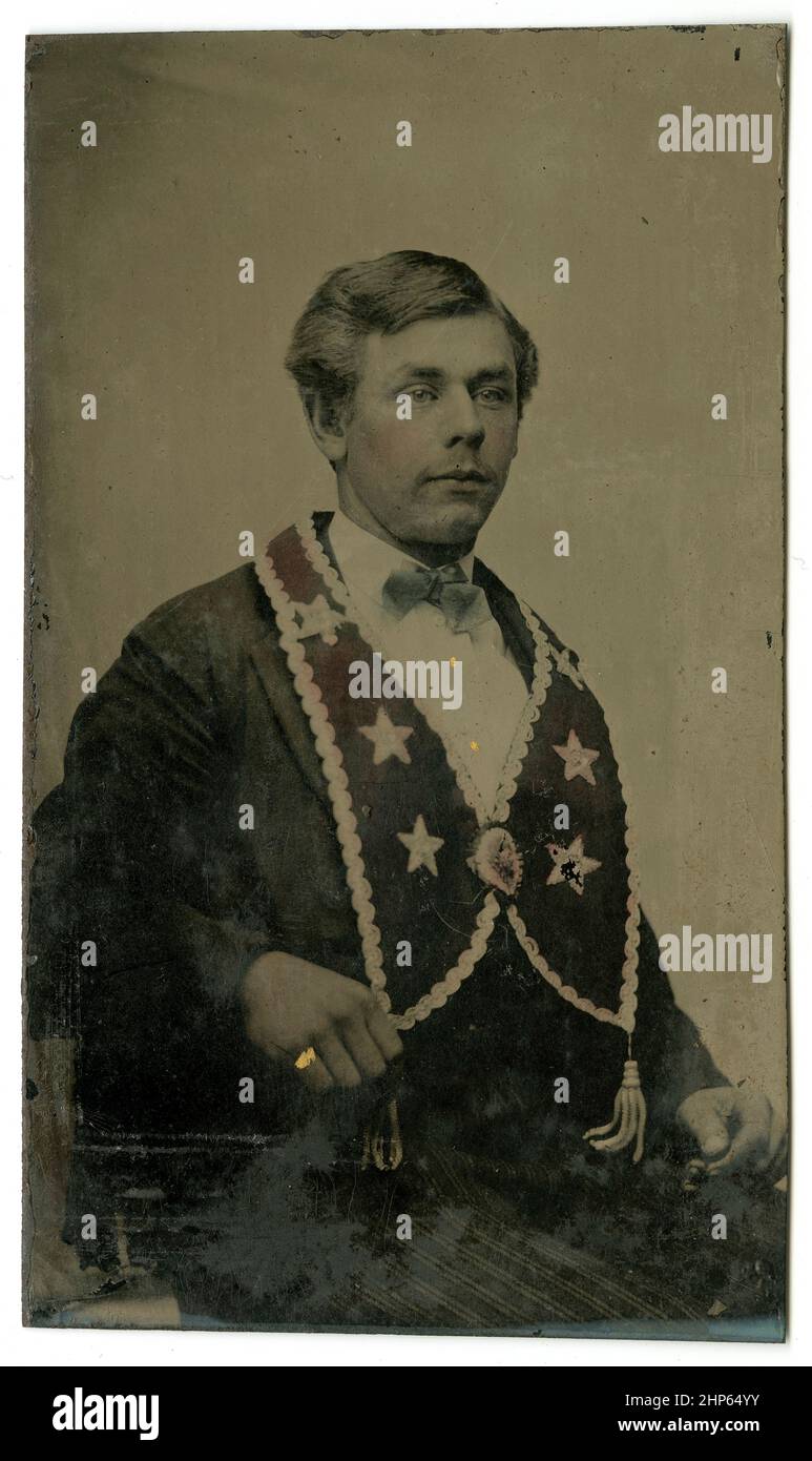Antique circa 1860 tintype photograph, a man with fraternal collar. Location unknown, USA. SOURCE: ORIGINAL TINTYPE Stock Photo