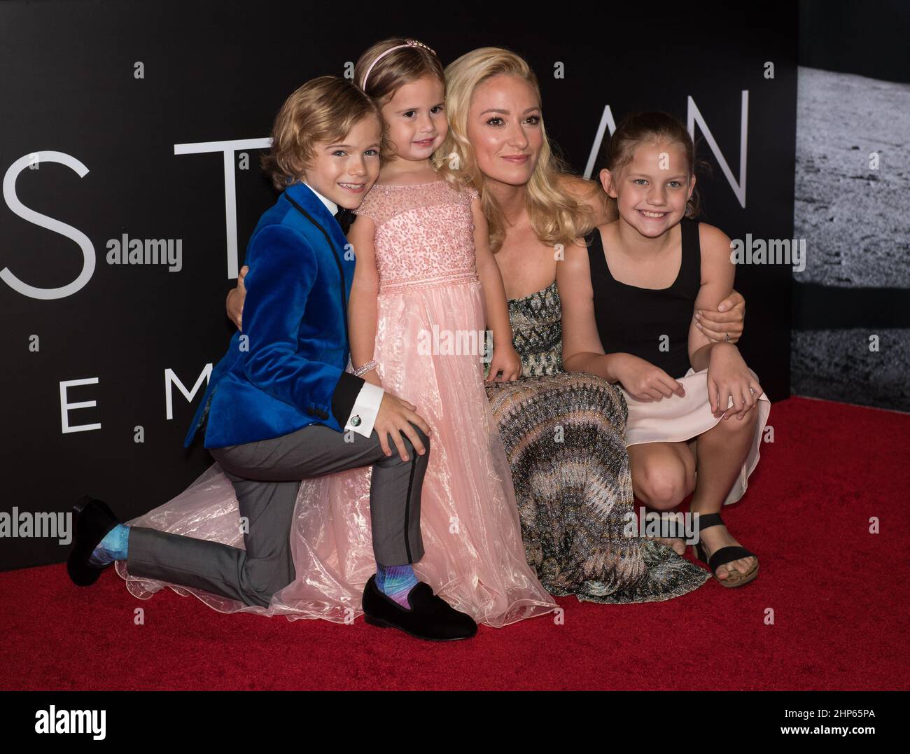 From left to right, American actor Gavin Warren, American actress Lucy Brooke Stafford, American actress Olivia Hamilton, and American actress Claire Smith arrive on the red carpet for the premiere of the film 'First Man' at the Smithsonian National Air and Space Museum Thursday, Oct. 4, 2018 in Washington. Stock Photo