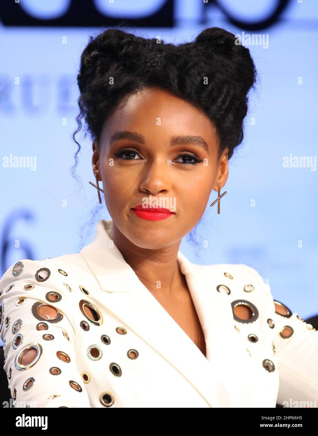 In the Press Site auditorium at the Kennedy Space Center in Florida, Janelle Monáe, speaks to members of the media during a news conference with other key individuals involved in the upcoming motion picture 'Hidden Figures.' The movie is based on the book of the same title, by Margot Lee Shetterly. Stock Photo