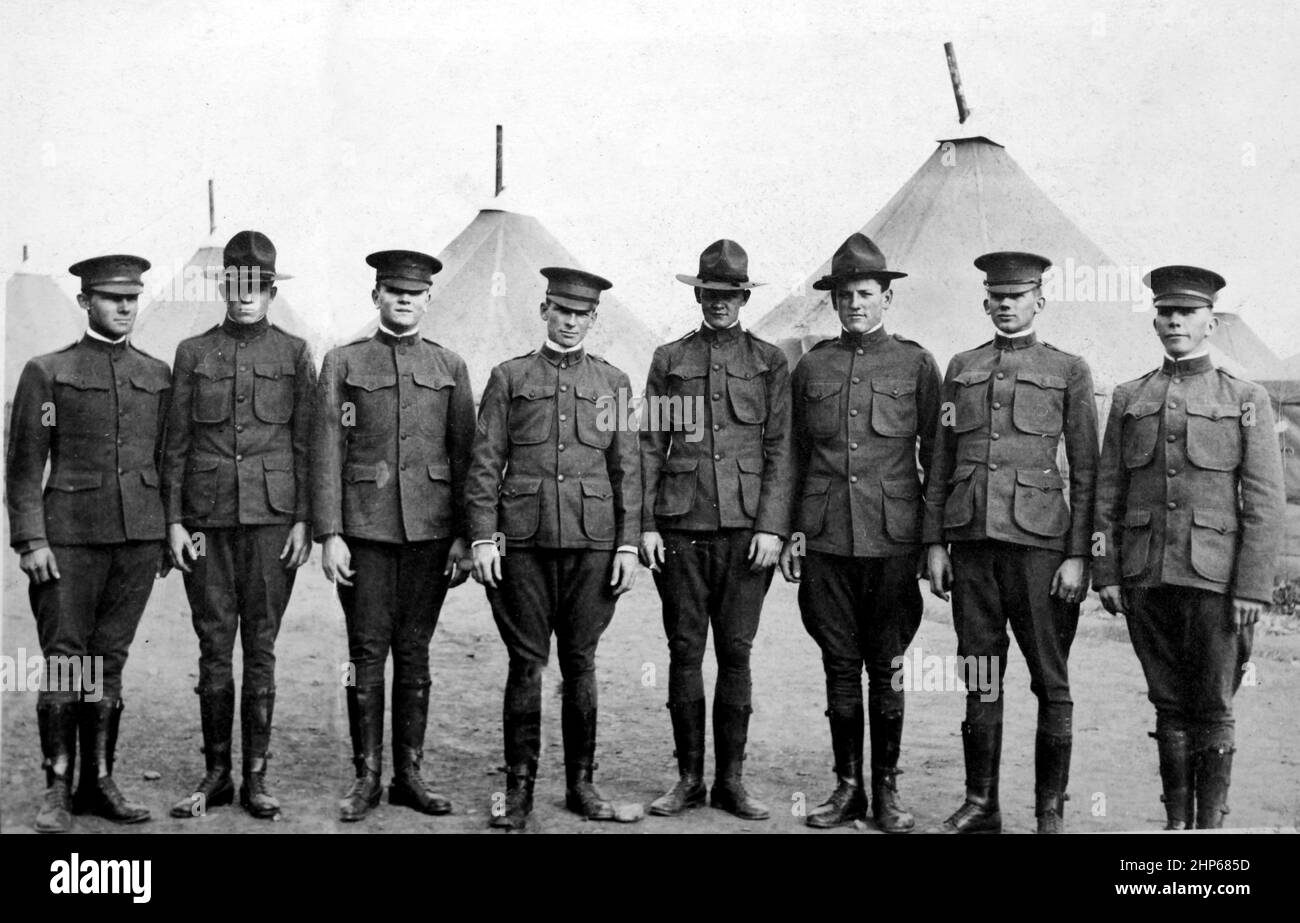 A World War I ear line up of officers and enlisted men at boot camp in