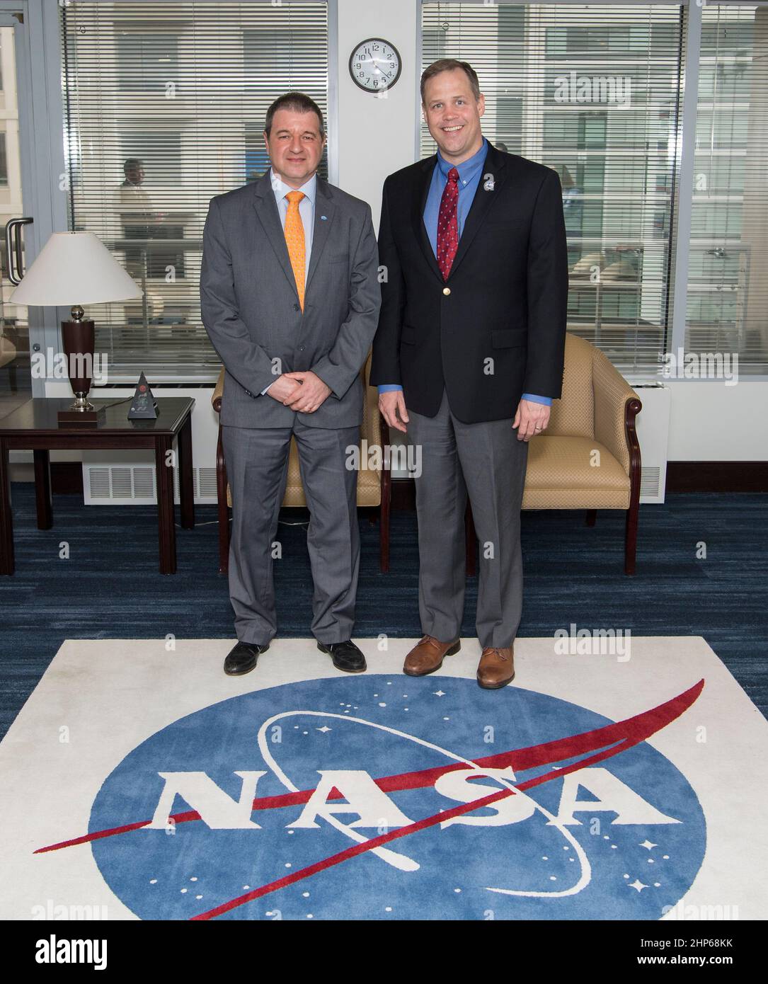 NASA Administrator Jim Bridenstine, right, poses for a photo with Mr. Raúl Kulichevsky, the Executive and Technical Director of the Argentine Space Agency (CONAE), Friday, March 29, 2019 at NASA Headquarters in Washington. Stock Photo