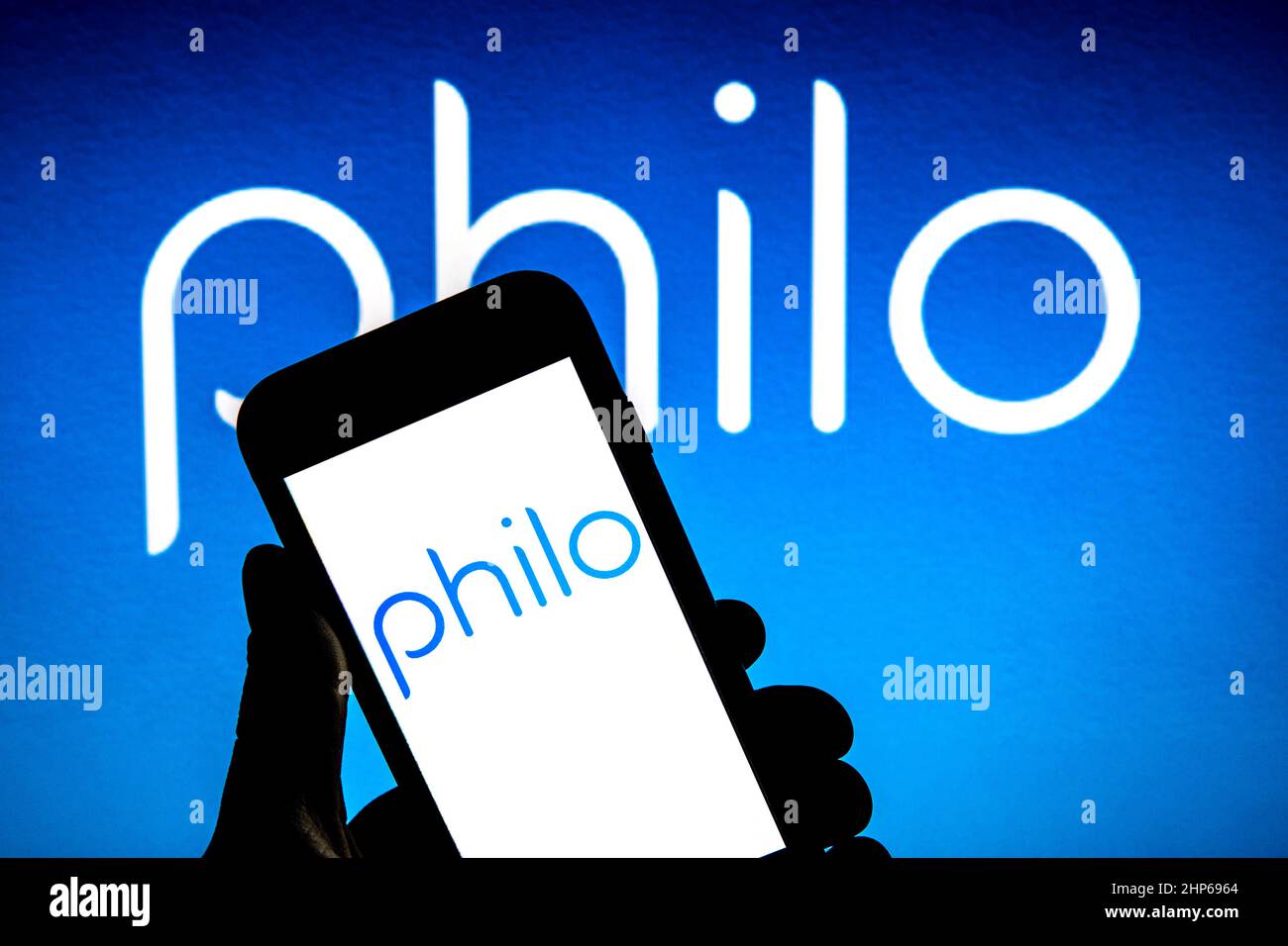 Spain. 17th Feb, 2022. In this photo illustration a Philo logo seen displayed on a smartphone with a Philo logo in the background. Credit: SOPA Images Limited/Alamy Live News Stock Photo