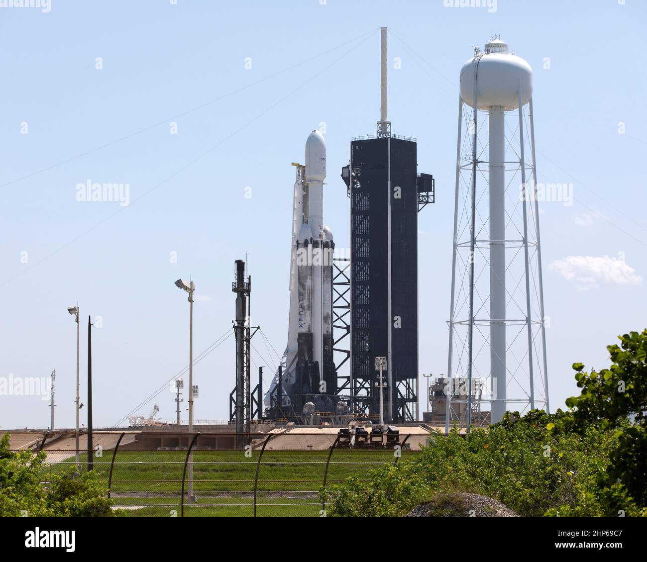 A SpaceX Falcon Heavy rocket is ready for launch on the pad at Launch Complex 39A at NASA’s Kennedy Space Center in Florida on June 24, 2019. SpaceX and the U.S. Department of Defense will launch two dozen satellites to space, including four NASA payloads that are part of the Space Test Program-2, managed by the U.S. Air Force Space and Missile Systems Center Stock Photo