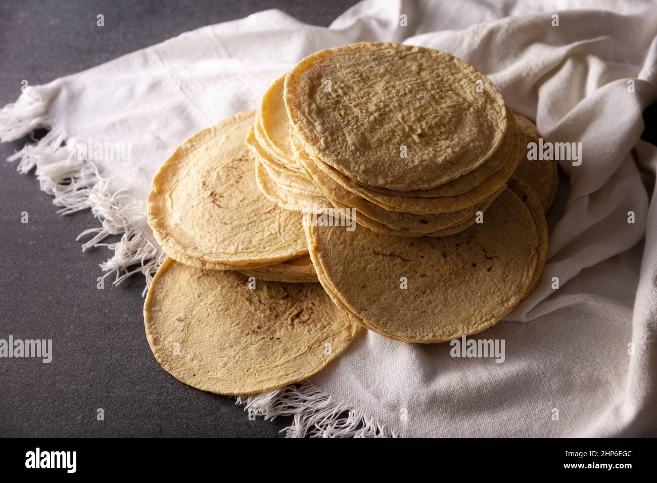 Corn Tortillas. Food made with nixtamalized corn, a staple food in