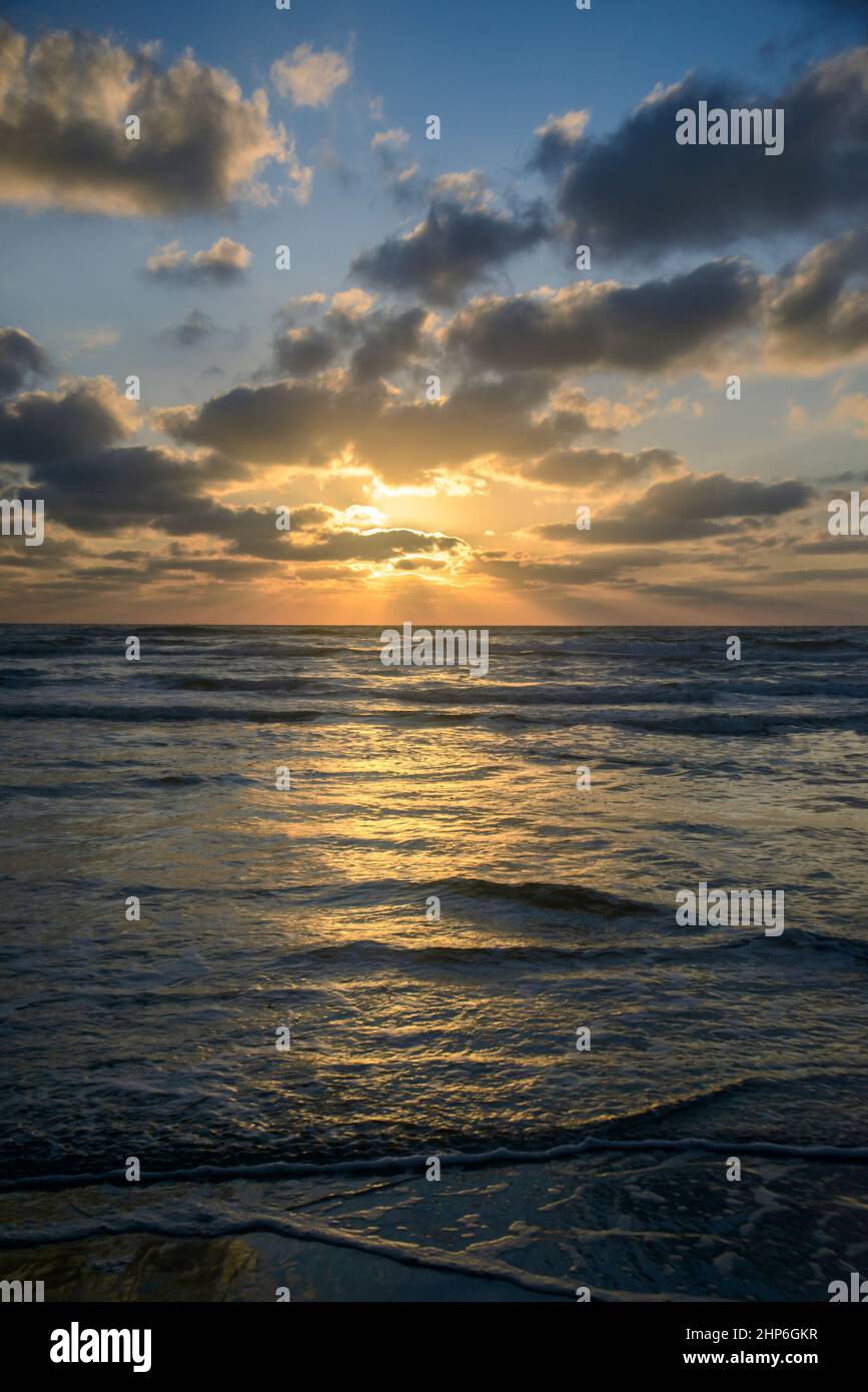 Ocean patterns with Sunrise over the ocean in Texas Stock Photo - Alamy