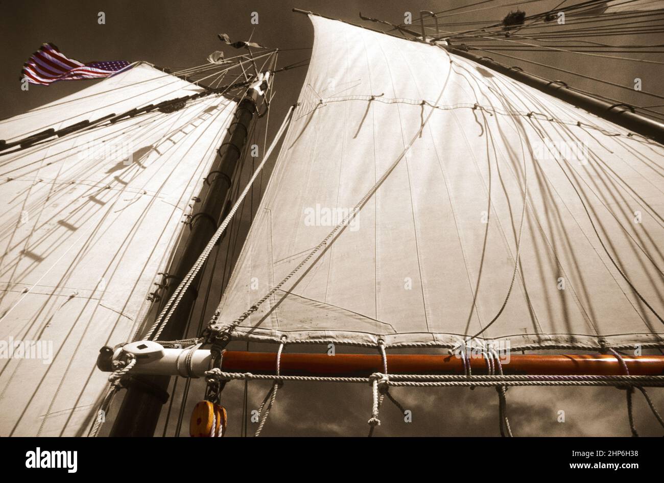 Cloth Sails on wooden rigging of a sailboat Stock Photo Alamy