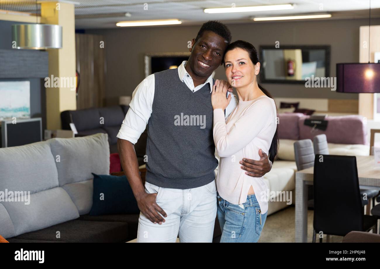 African man with his wife are satisfied of new furniture Stock Photo