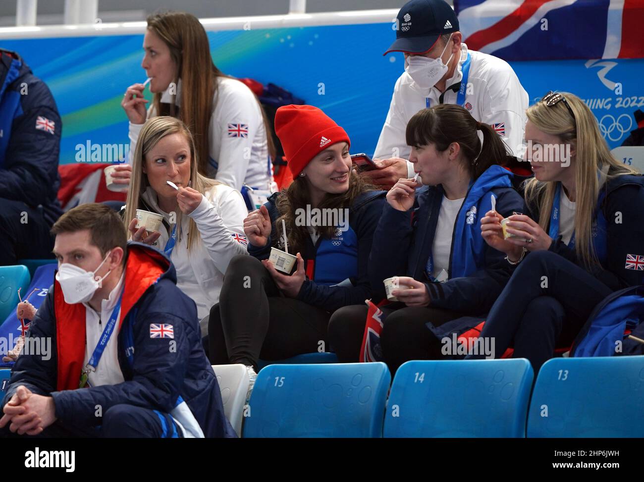 Great Britains Jennifer Dodds (second left), Hailey Duff and Vicky Wright (right) from the Womens Curling team watch the action in the Mens Gold Medal game during day fifteen of the Beijing