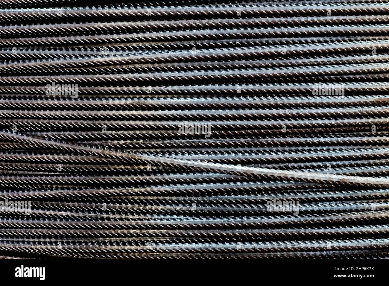 Close-up stacked wire steel rebar material, rebar for industrial and construction work, texture and background Stock Photo
