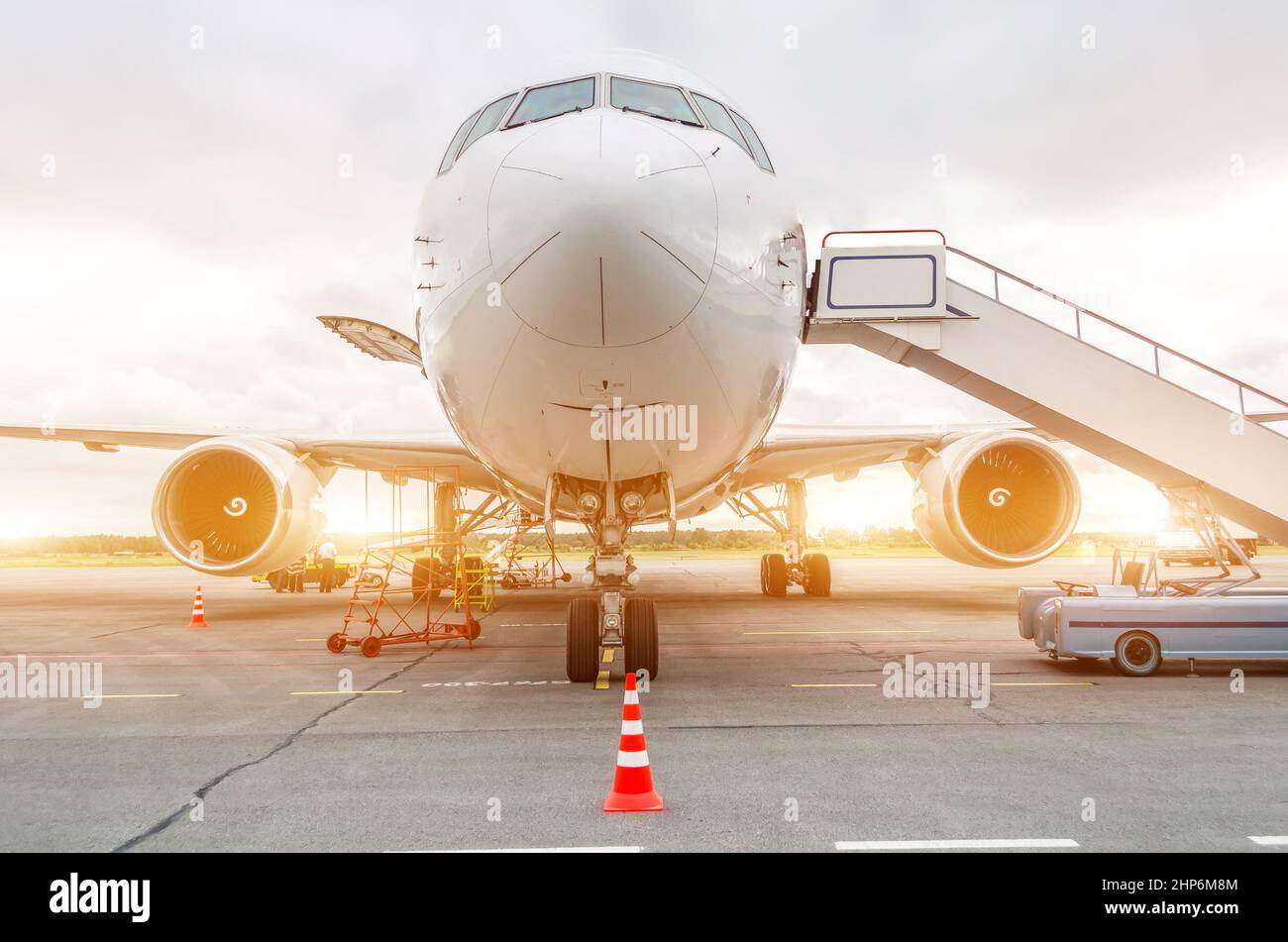 Passenger aircraft parked at the airport with ladder ladder Stock Photo