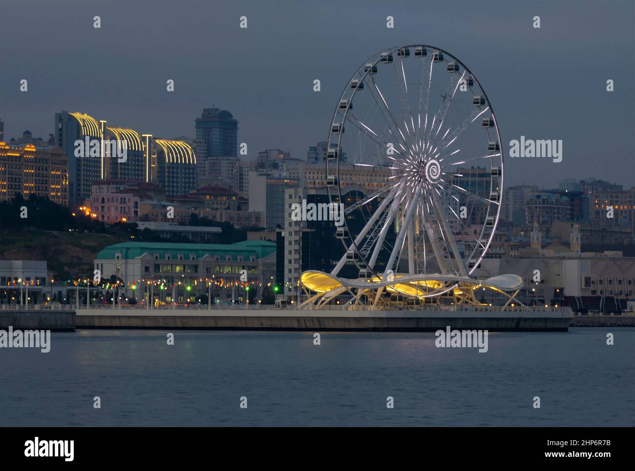 View of the Caspian Sea embankment on a cloudy December evening. Baku, Azerbaijan Stock Photo