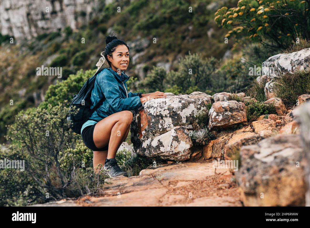 Smiling explorer looking mountain hi-res stock photography and images ...